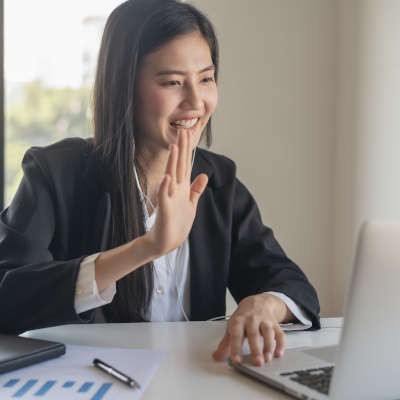 When Did Waving Become a Part of Business Meetings?